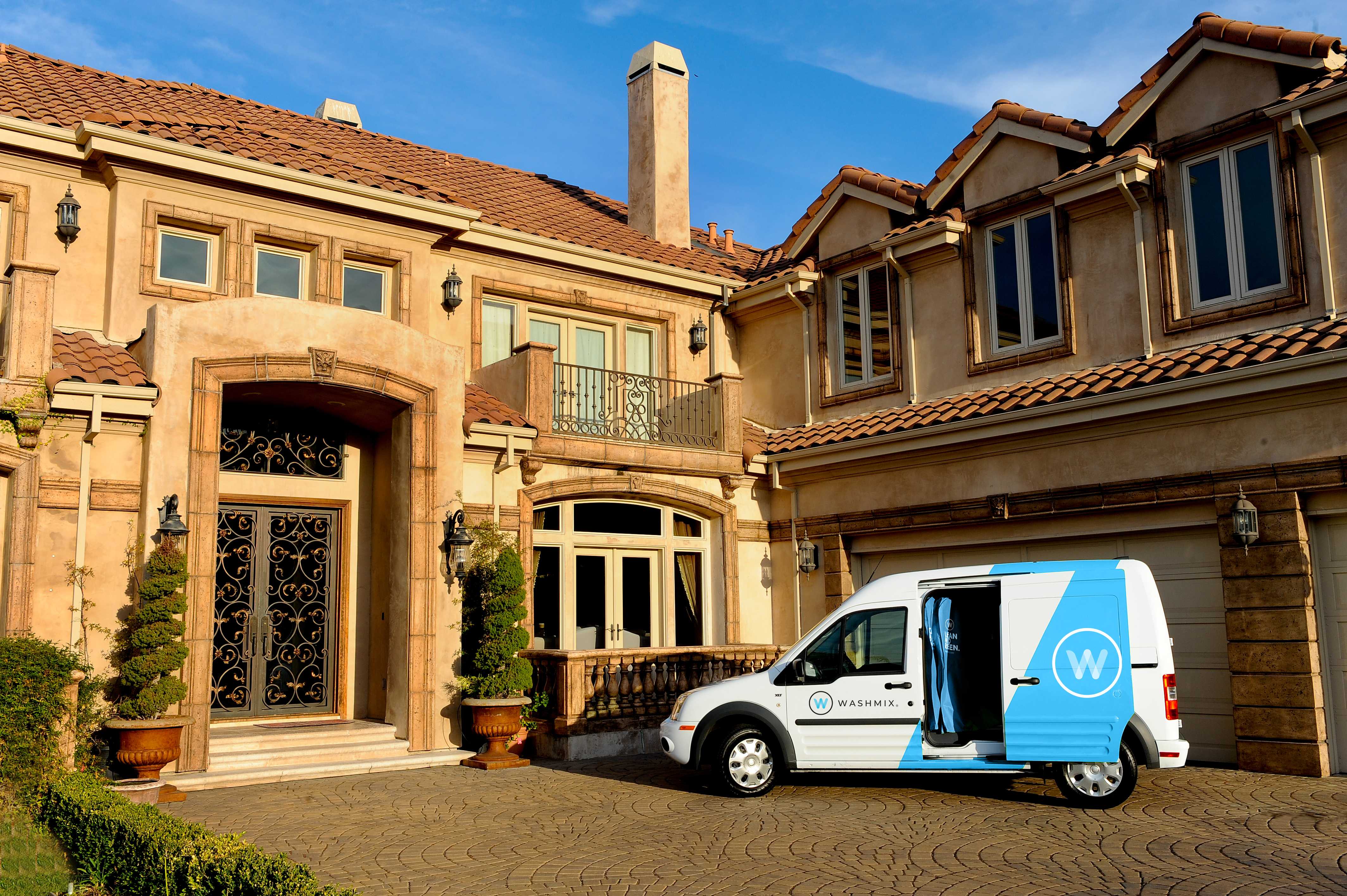 Washmix delivery van at luxury residence